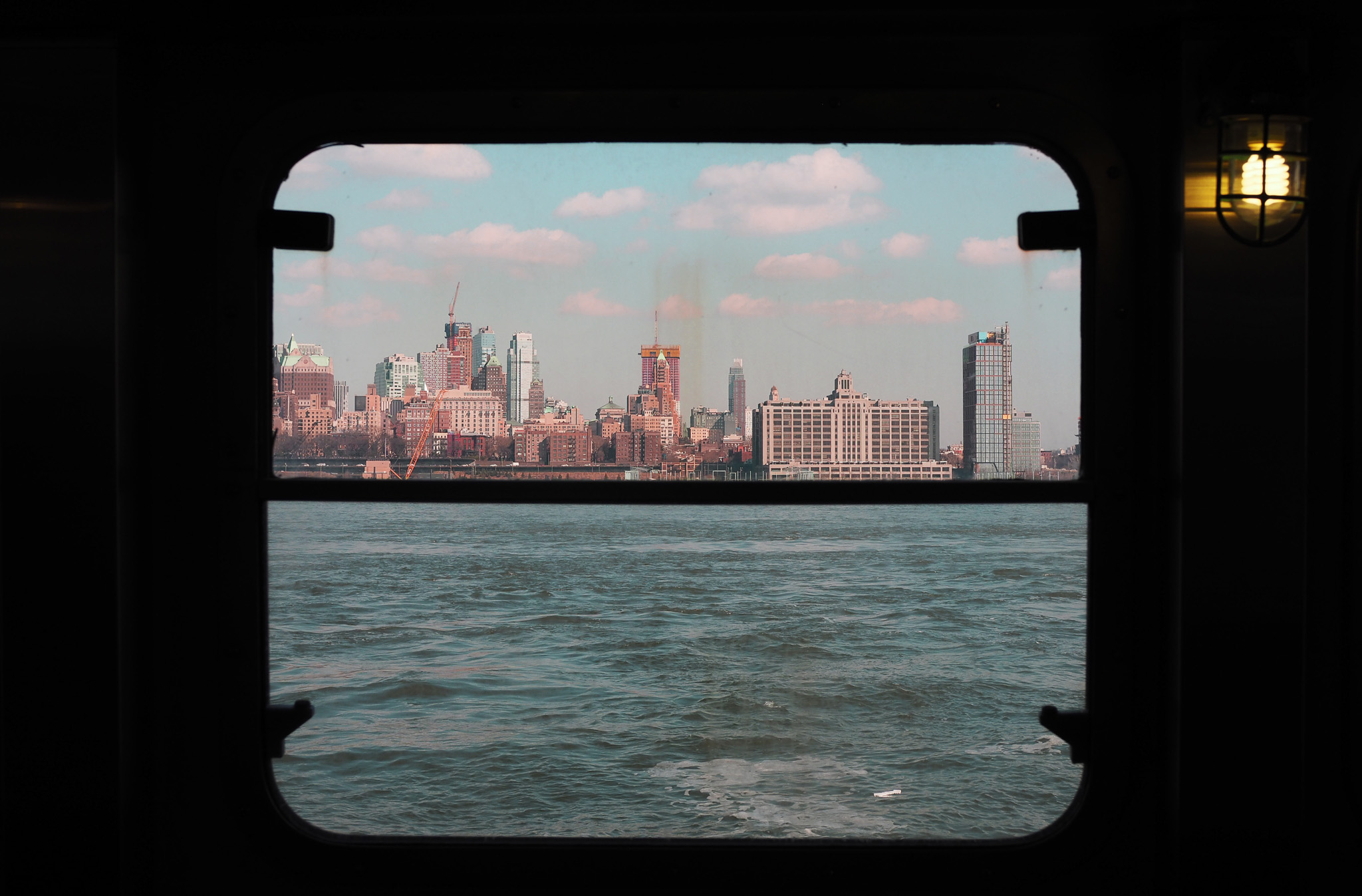 window frame view inside Manhattan ferry